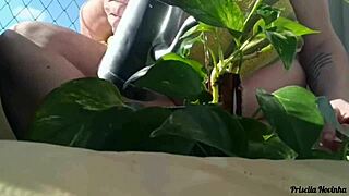 Naked Amateur Flashes Big Natural Tits Watering Plants On Balcony