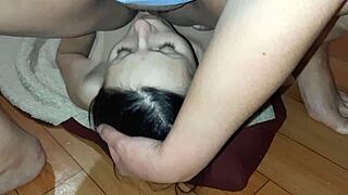 Lesbian dom facesits with feet while fingering her slave