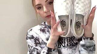 Serbian girl slips off sneakers bares her soft feet