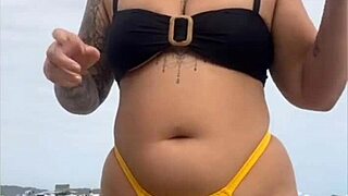 yellow bikini splits my swollen pussy on beach...