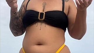 yellow bikini splits my swollen pussy on beach...