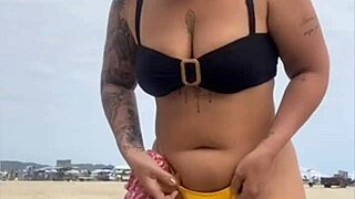 yellow bikini splits my swollen pussy on beach...