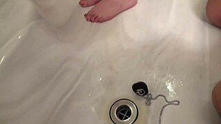 japanese busty milf soaks huge natural tits in steamy bath