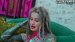 Heavily tattooed goth girl gaps asshole with anal toys in lingerie solo