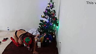 milf teases big pussy with dildo by christmas tree lights