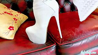 heart pounds watching lady lucy's curvy milf tits spill from white thigh boots on leather sofa