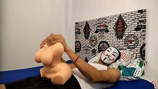 Bodybuilder pounds tattooed sex doll to monster orgasm with big cock