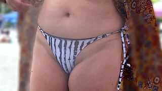stepmom's bikini flash on beach makes cocks throb hard voyeur