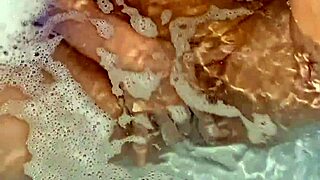 Teen latina masturbates to tub orgasm