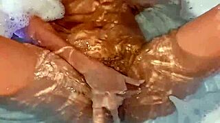 Teen latina masturbates to tub orgasm