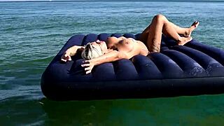 Hey blonde beach babe, show those big tits nude in public!