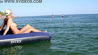 Hey blonde beach babe, show those big tits nude in public!