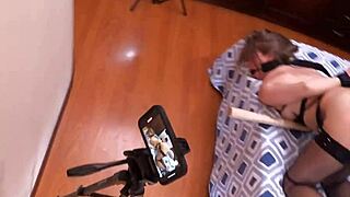 hey this bound sub's tied up getting rough slave treatment