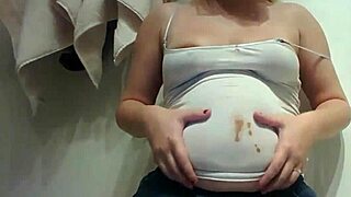 Chubby blonde teen smears chocolate on fat belly