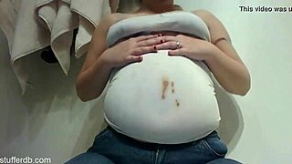 Chubby blonde teen smears chocolate on fat belly