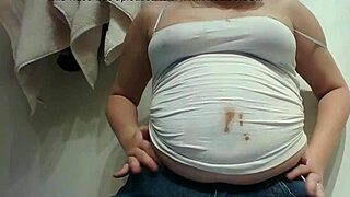 Chubby blonde teen smears chocolate on fat belly