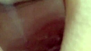 Glass dildo stretches tight juicy pussy deep.