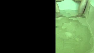 Horny married bride masturbates to orgasm in wedding bath with dildo