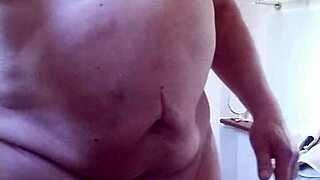 Who's peeking at Chris showering her wet body?