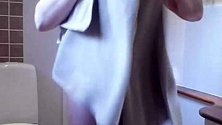 Who's peeking at Chris showering her wet body?
