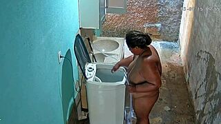 Hidden Cam Catches Stepmom Bathing Exposing Huge Tits Yard