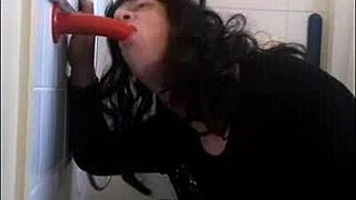 Crossdressing sissy bisexual deepthroats dildo ass to mouth
