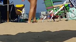 hidden cam catches bikini slut's ass at beach