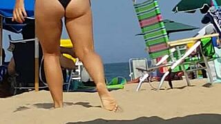 hidden cam catches bikini slut's ass at beach