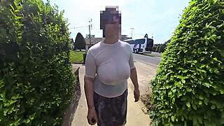 Busty milf struts braless in see-thru top down slutty street