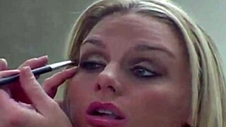 Blonde prostitute applies heavy makeup seductively