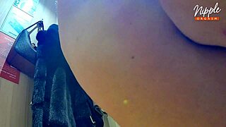 Brunette wife masturbates in public changing room