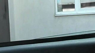 Nude woman neighbor sexy mature milf without panties and bra washes windows her apartment a taxi driver watches from car solo naked in public peeping outdoor outside publicly big natural tits pussy