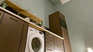 Hot brunette removes panties under mini skirt in kitchen