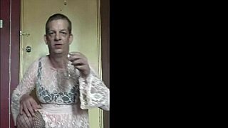 crossdresser drinks full glass of his piss