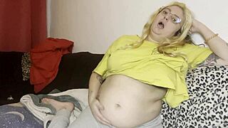 Latina gets belly massage on the couch