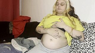 Latina gets belly massage on the couch