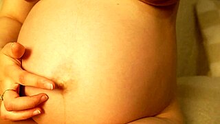 Pregnant stepsister twerks and rubs camel toe pussy in pink leggings