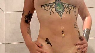 thick redhead tonguefucks her own nipples and clit in shower